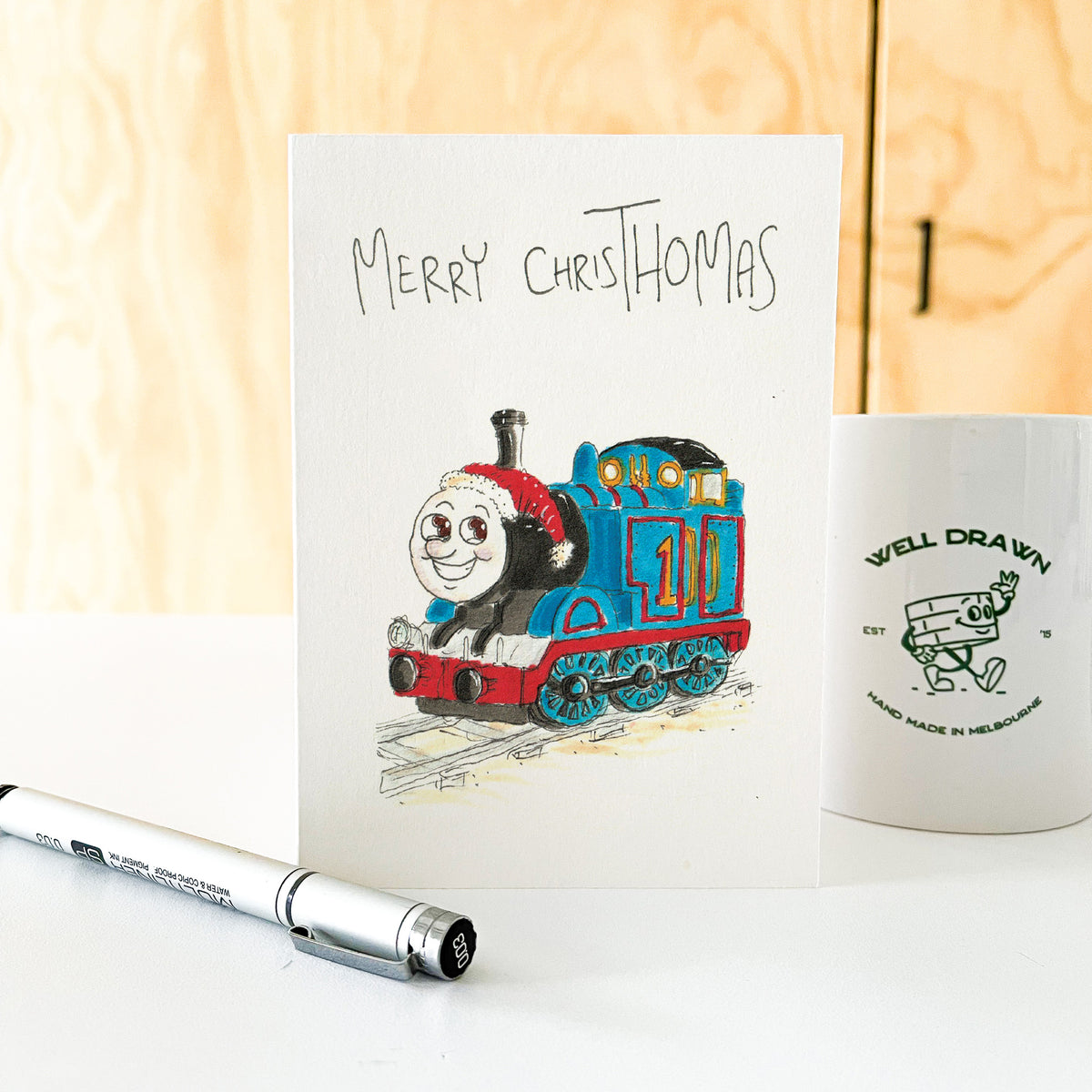 Merry ChrisThomas funny hand-drawn blue train Christmas greeting card by Well Drawn Australia, image 6