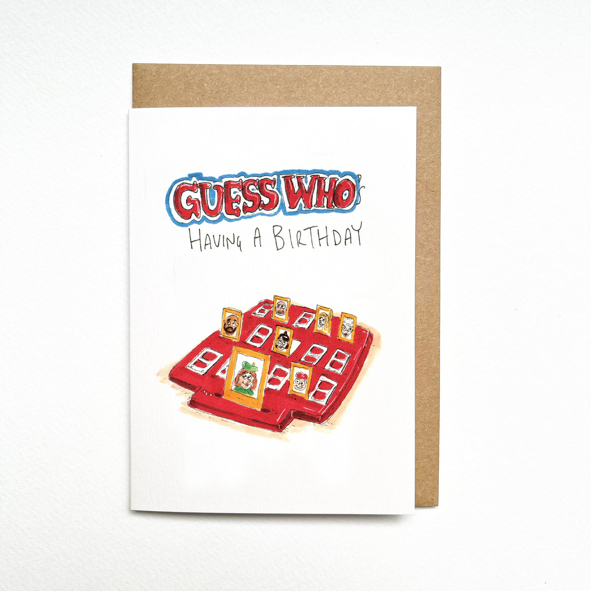 GUESS WHO's Having a Birthday – a bright red Guess Who-style tabletop board full of little character portraits by Well Drawn Melbourne. Front product photo.