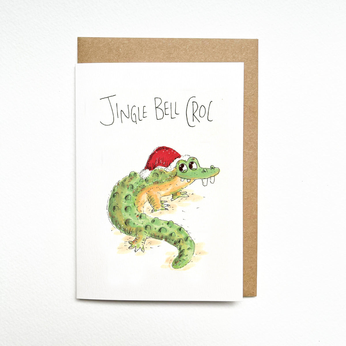 Jingle Bell Croc hand-drawn funny crocodile Christmas card by Well Drawn Australia