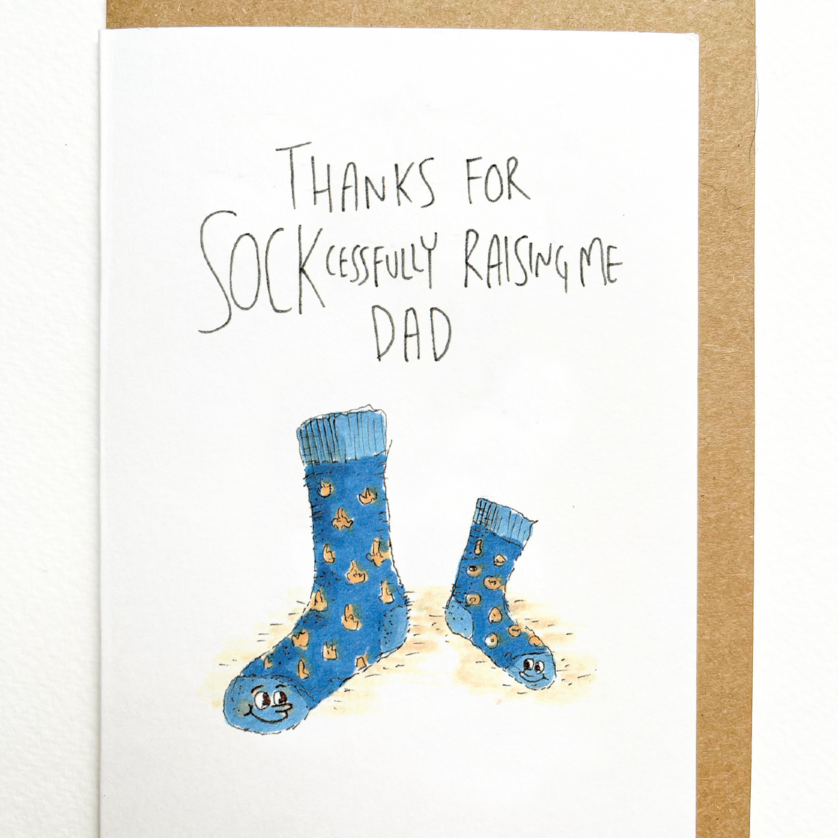 Thanks for Sockcessfully Raising Me Dad greeting card lifestyle photo